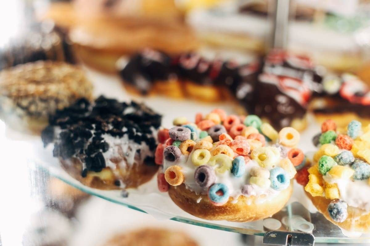 Donuts with cereal on top.