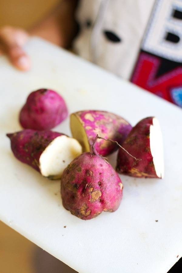 Camotes on a cutting board.