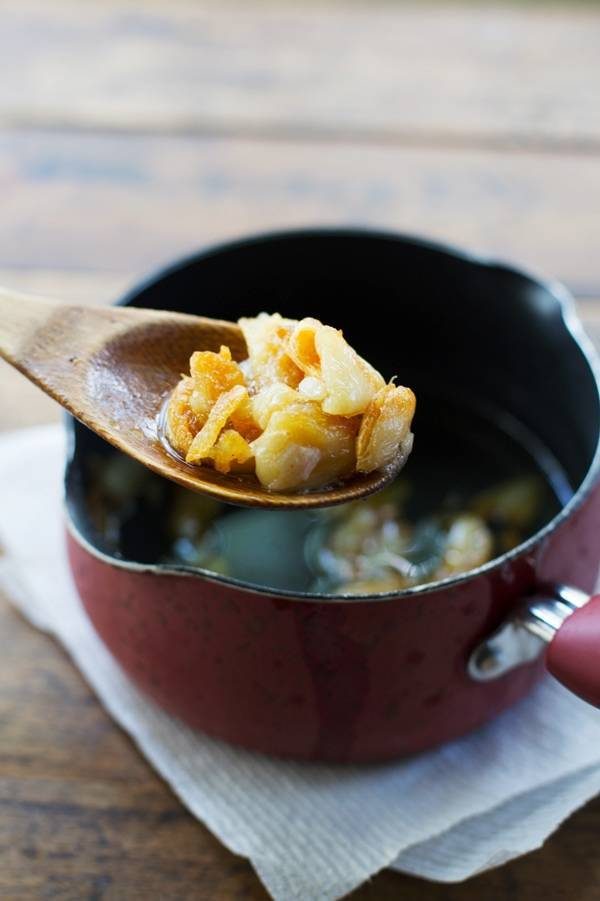 Food on a wooden spoon.