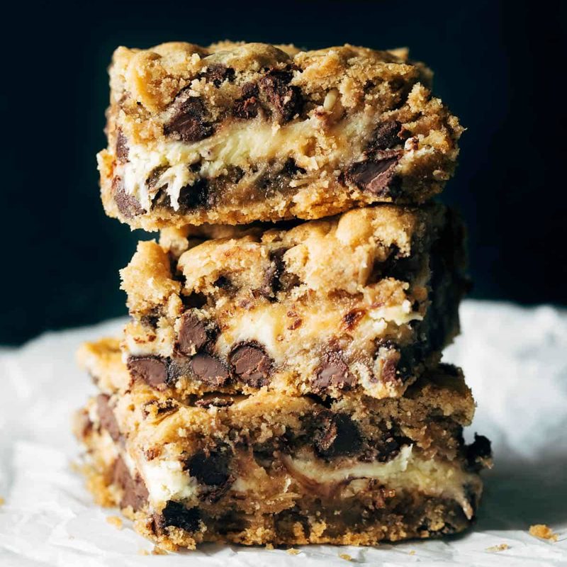 A picture of Peanut Butter Chocolate Chip Cookie Cheesecake Bars