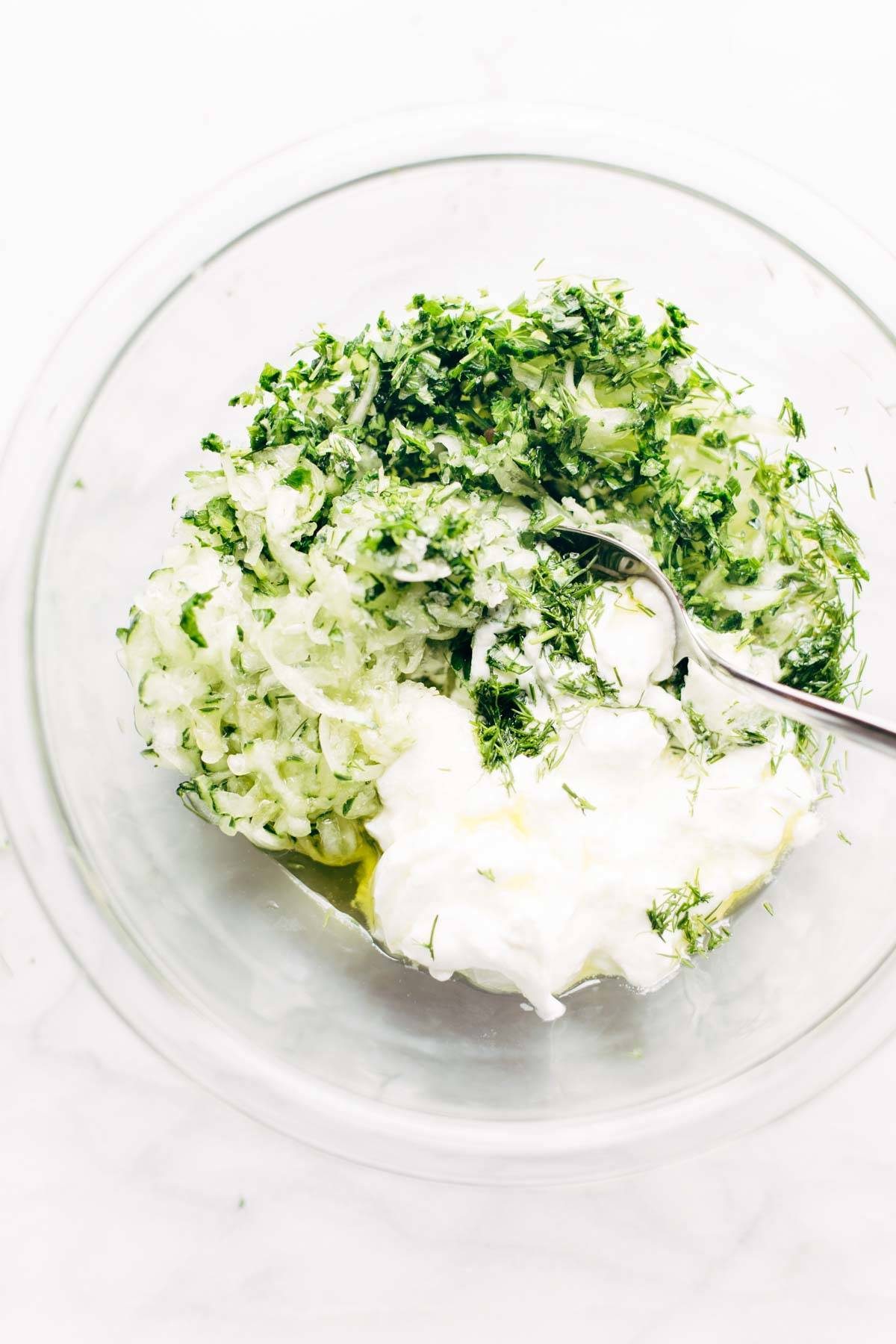 Loaded Mediterranean Street Fries ingredients in a bowl.
