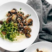 A picture of Oven Risotto with Garlic Roasted Mushrooms and Arugula