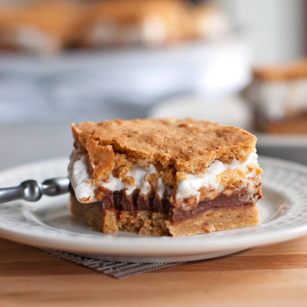 Straight on shot of s'mores bars on parchment paper